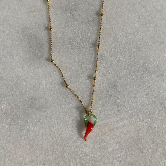 Collar de chile relleno de oro