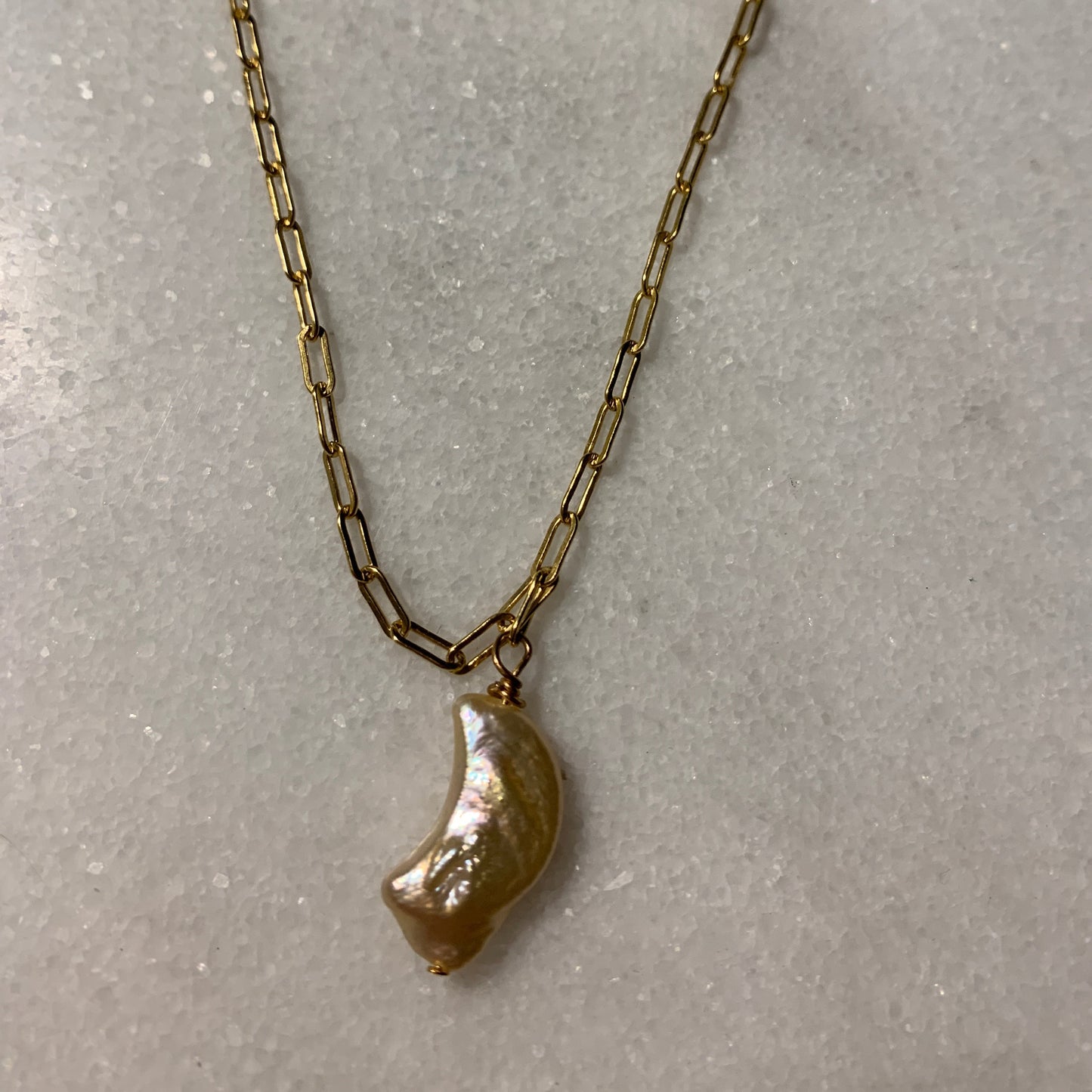 Llévame al collar lleno de oro de la luna