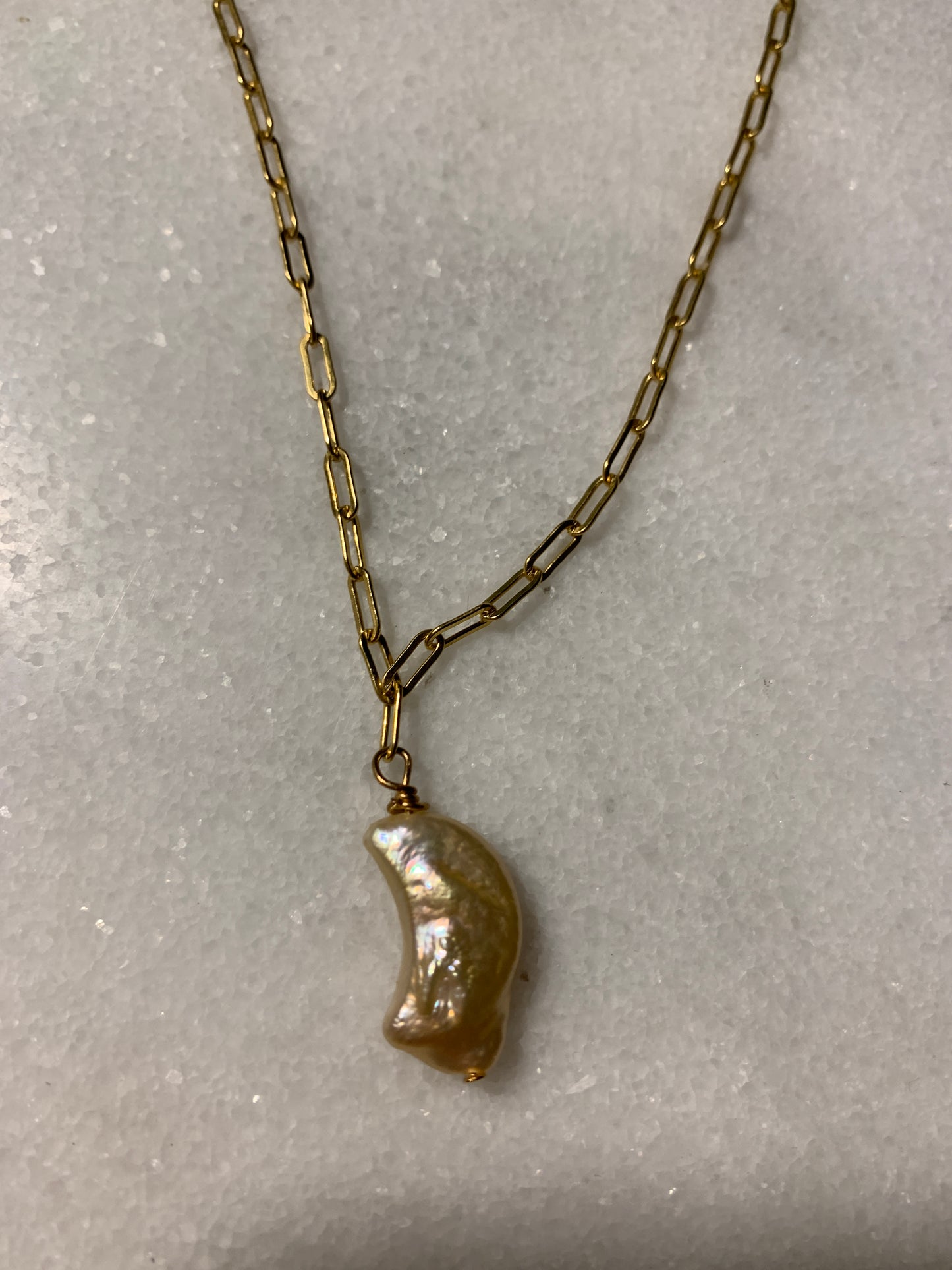 Llévame al collar lleno de oro de la luna